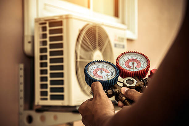 Professional Heat Pump Repair technician working in Andover, MA